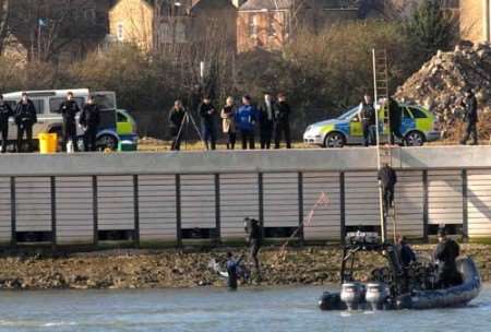 Divers and Kent police officers at the scene. Picture: BARRY CRAYFORD