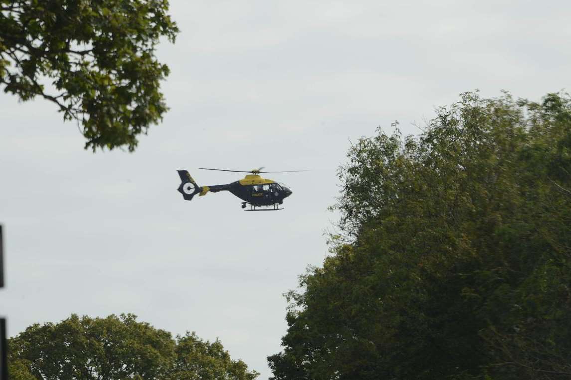 Helicopter circling over the area. Stock picture