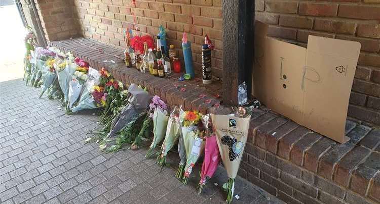 Tributes were left to an 18-year-old stabbing victim in an alleyway off Dartford High Street