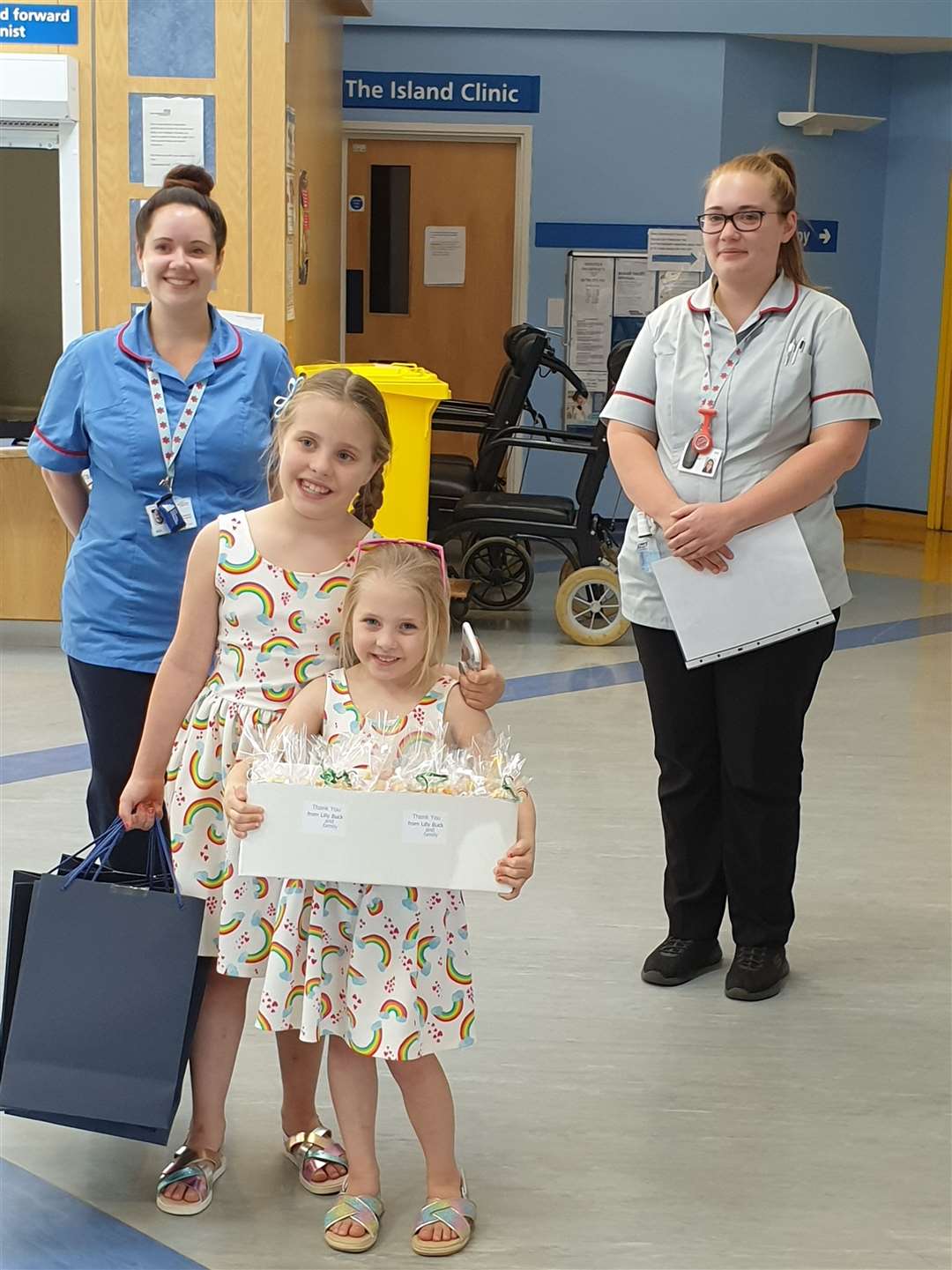 Little Lilly Buck and her family delivering gifts to Sheppey Community Hospital