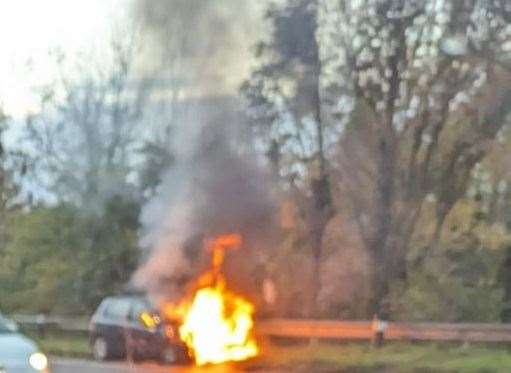 A car is on fire on Blue Bell Hill near Chatham