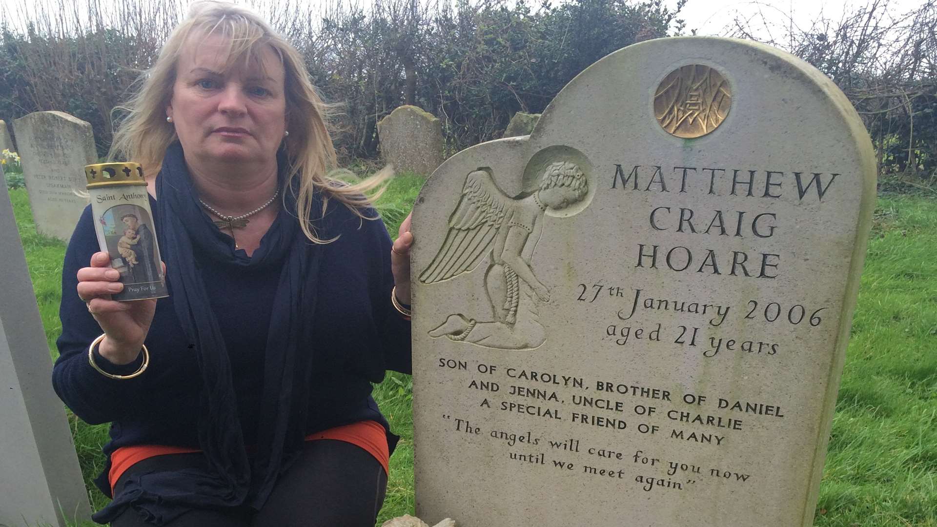 Carolyn Hoare at her son Matthew's graveside