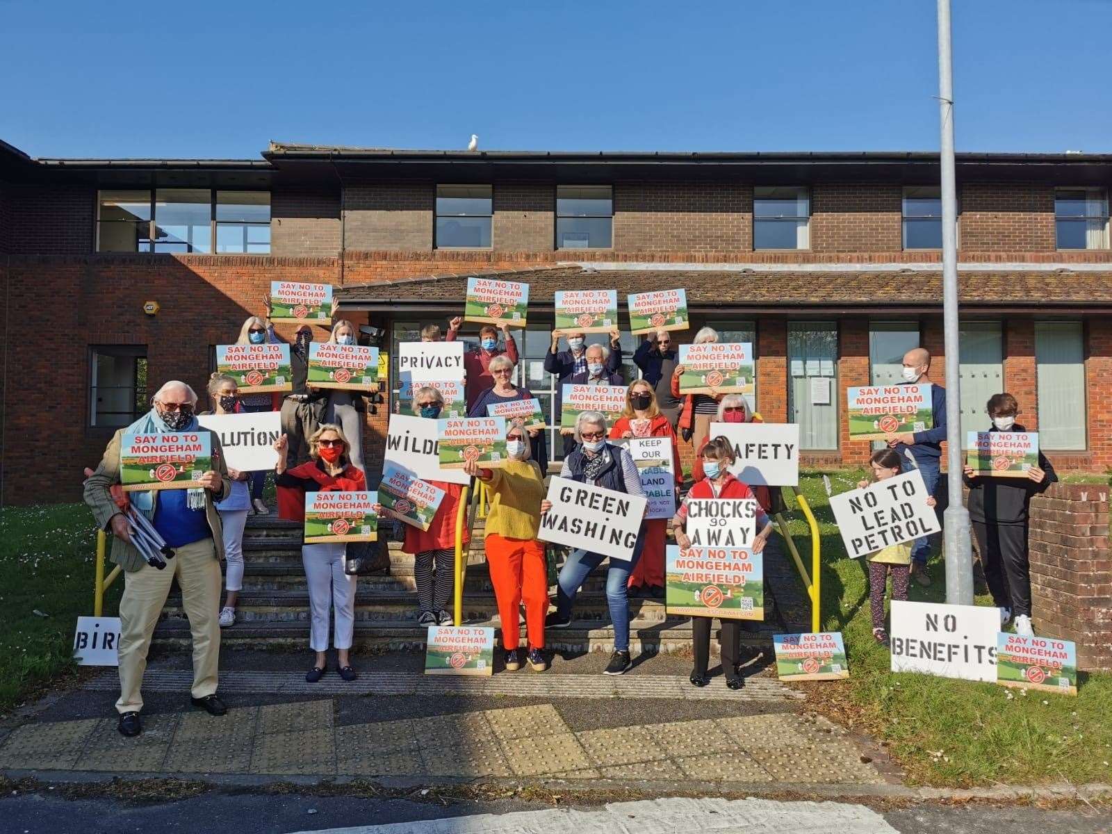 The campaigners protested at the offices of Dover District Council which will make the decision about the planned airfield