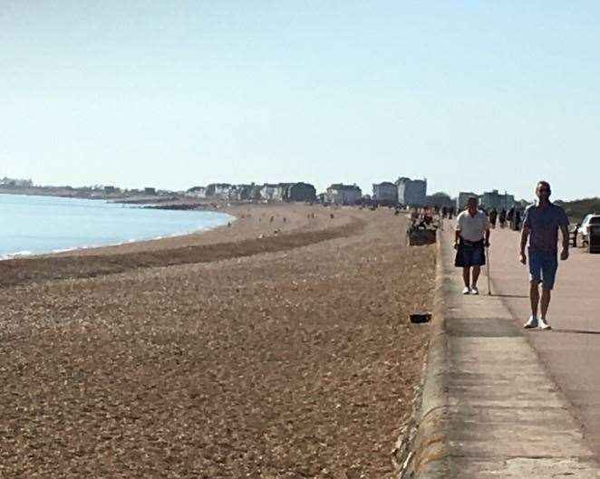 People were pictured on Hythe seafront at the weekend. Picture: FHDC
