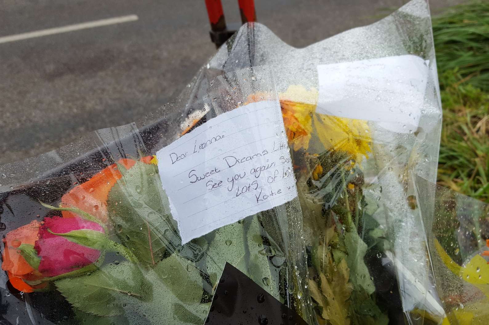 Flowers and messages have been left in Henhurst Road following the fatal crash