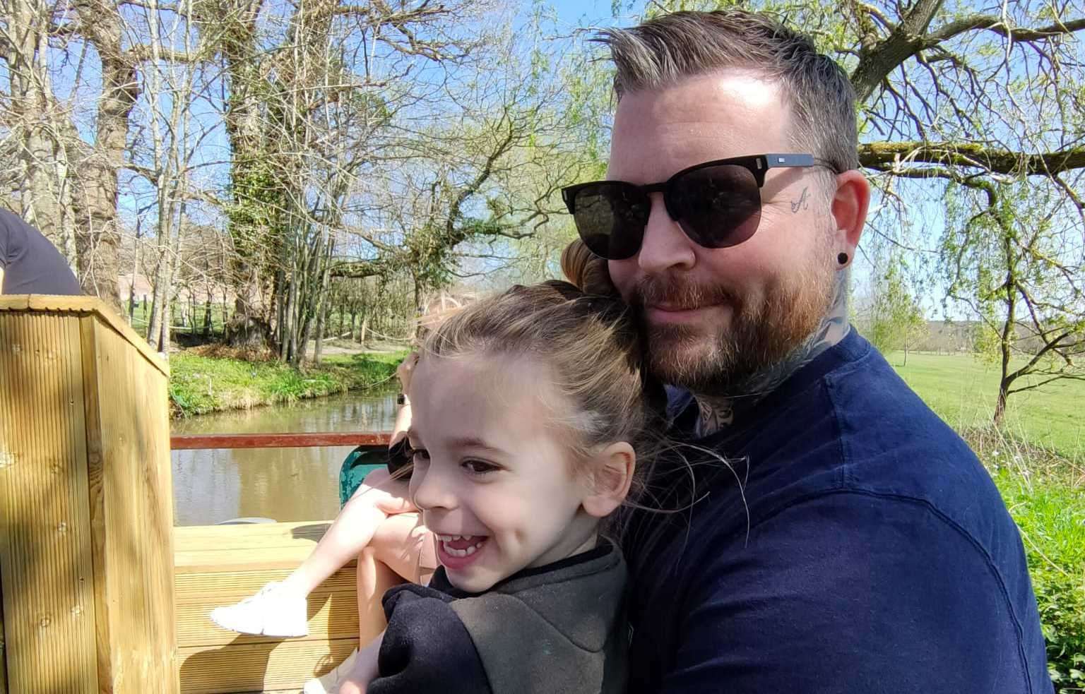 Leon Zanre, pictured with son Abel, has been told by medics that it could be years until he can walk properly again following the crash. Picture: Leon Zanre