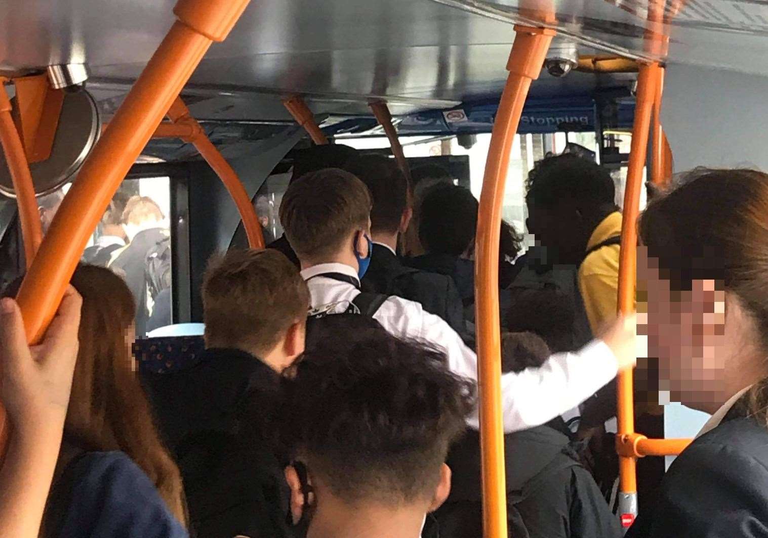 School pupils from Canterbury crowding to leave the bus in the afternoon