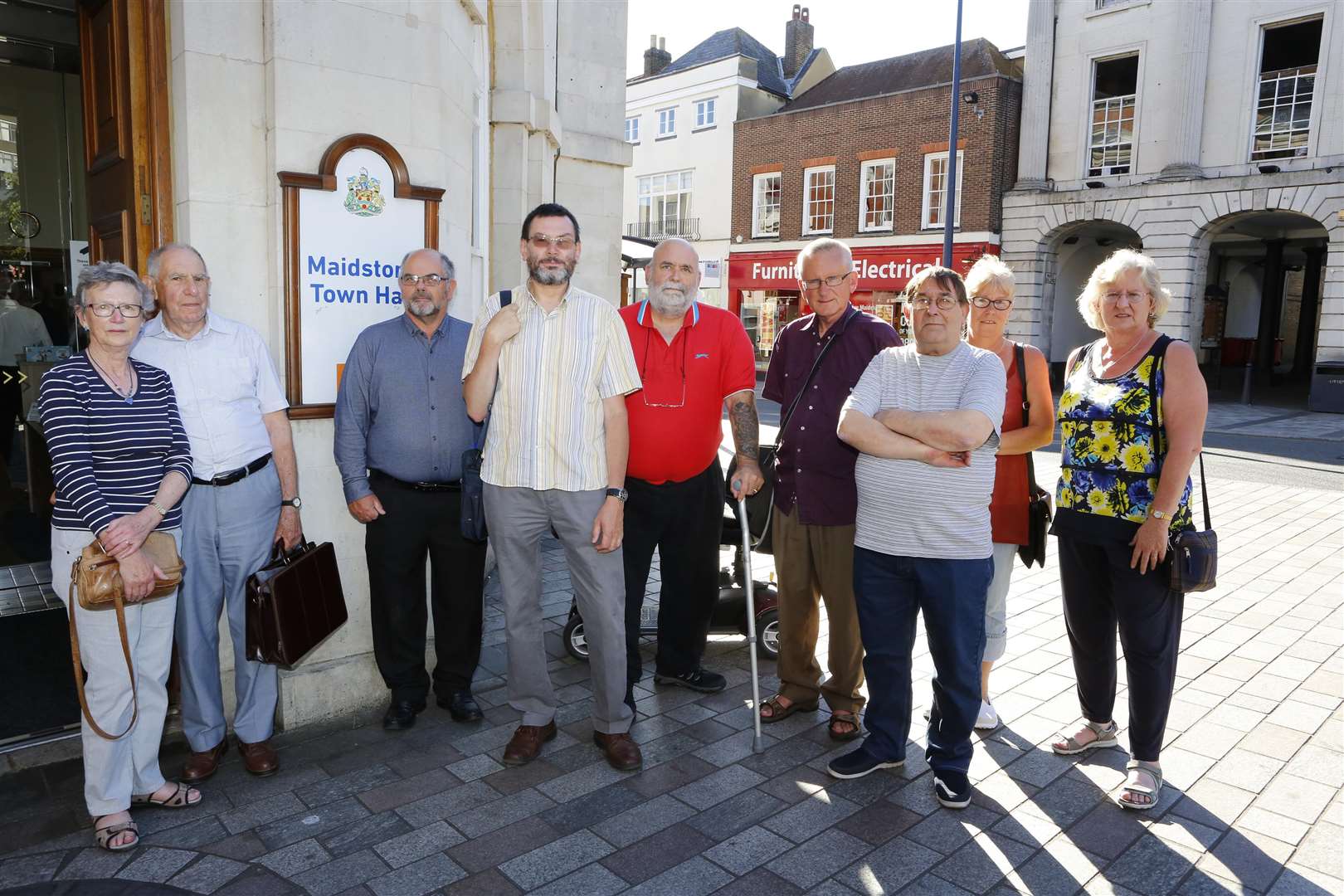 Cllr Paul Harper and Fant residents outside the Town Hall protesting at the hearing