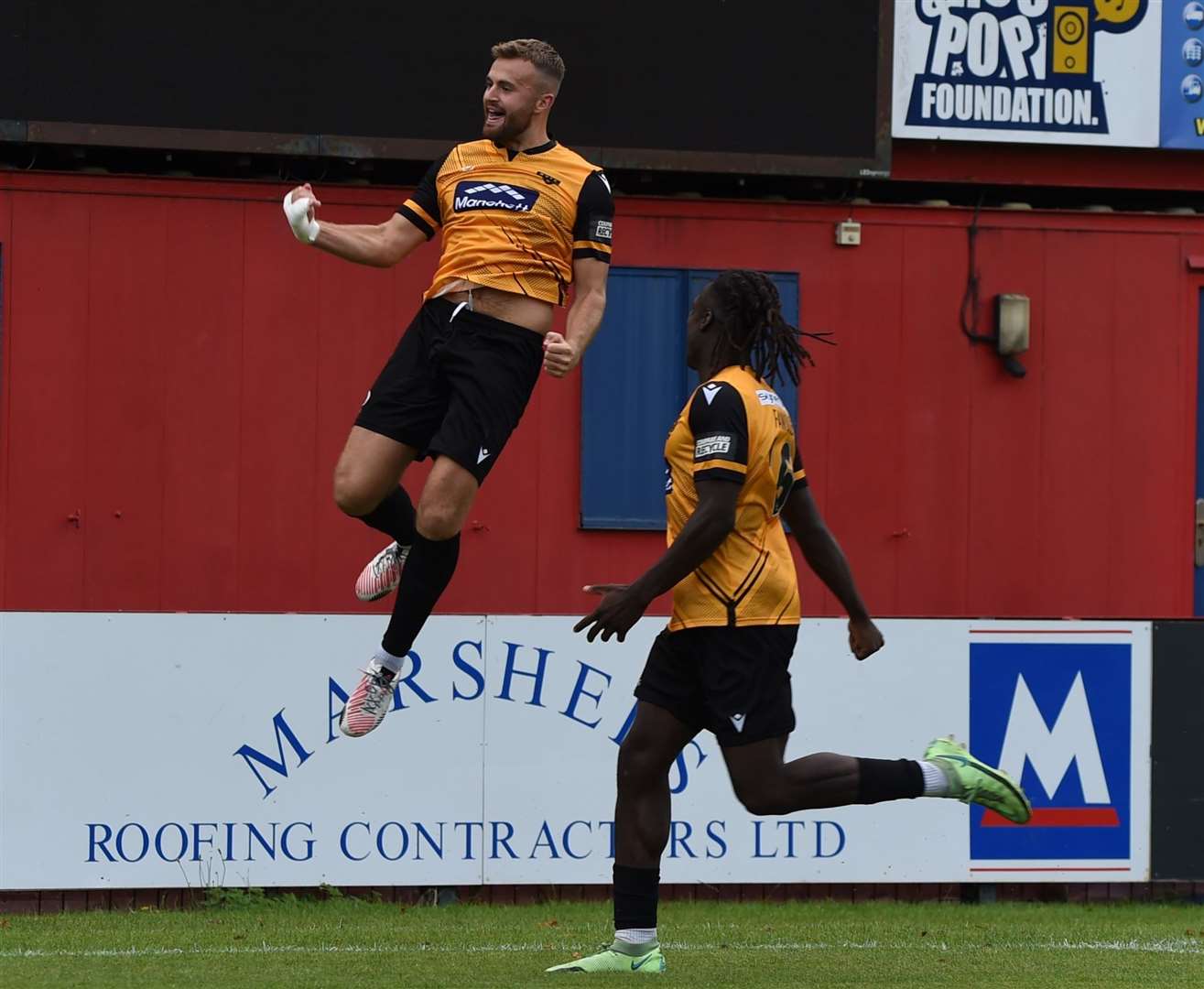 Regan Booty's penalty set Maidstone on their way to victory at Aldershot. Picture: Steve Terrell