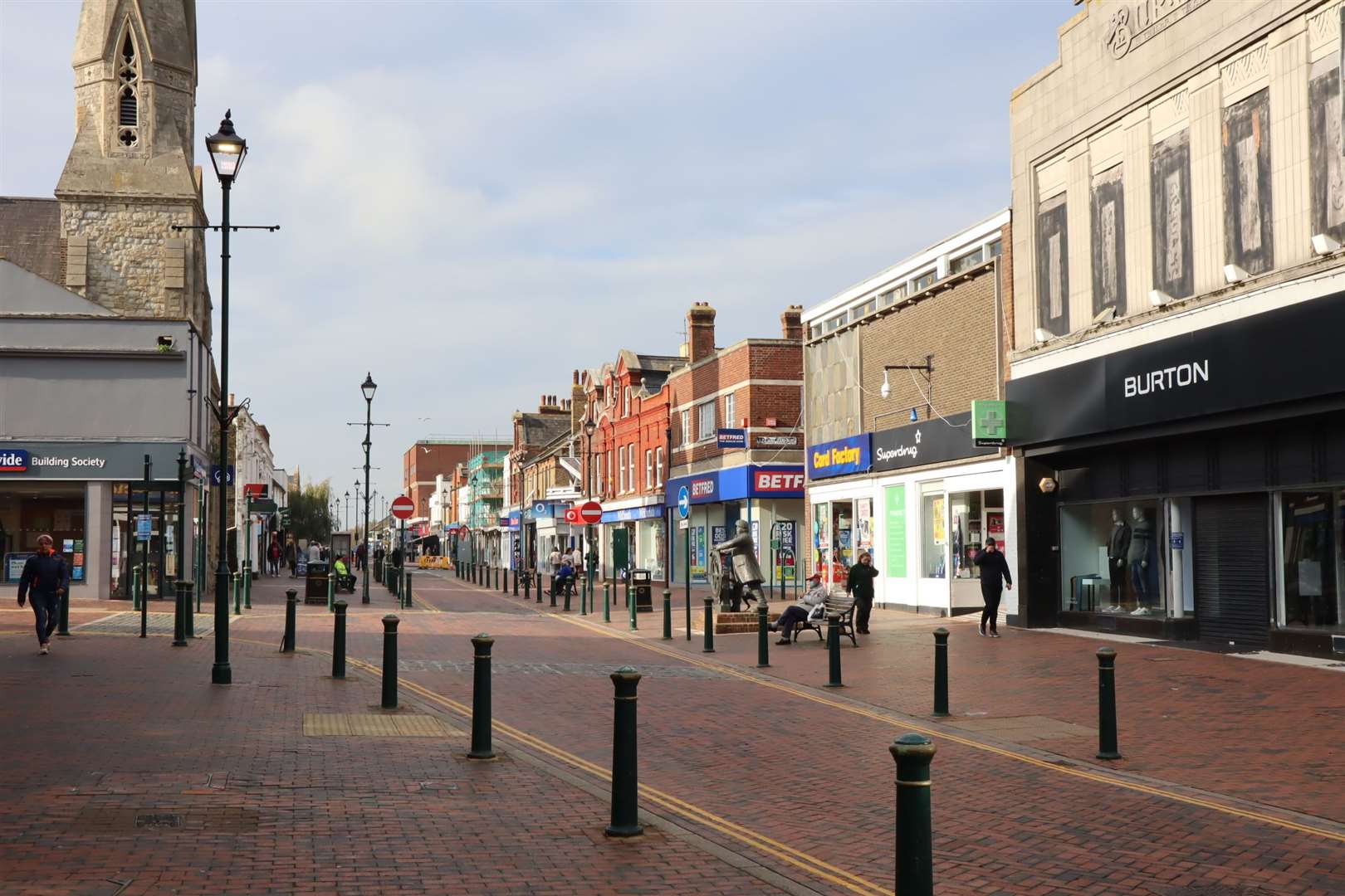 The robbery and assault took place at a shop in Sittingbourne High Street