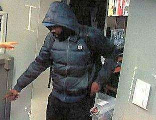 CCTV image of Hunte approaching safe. Picture: Kent Police