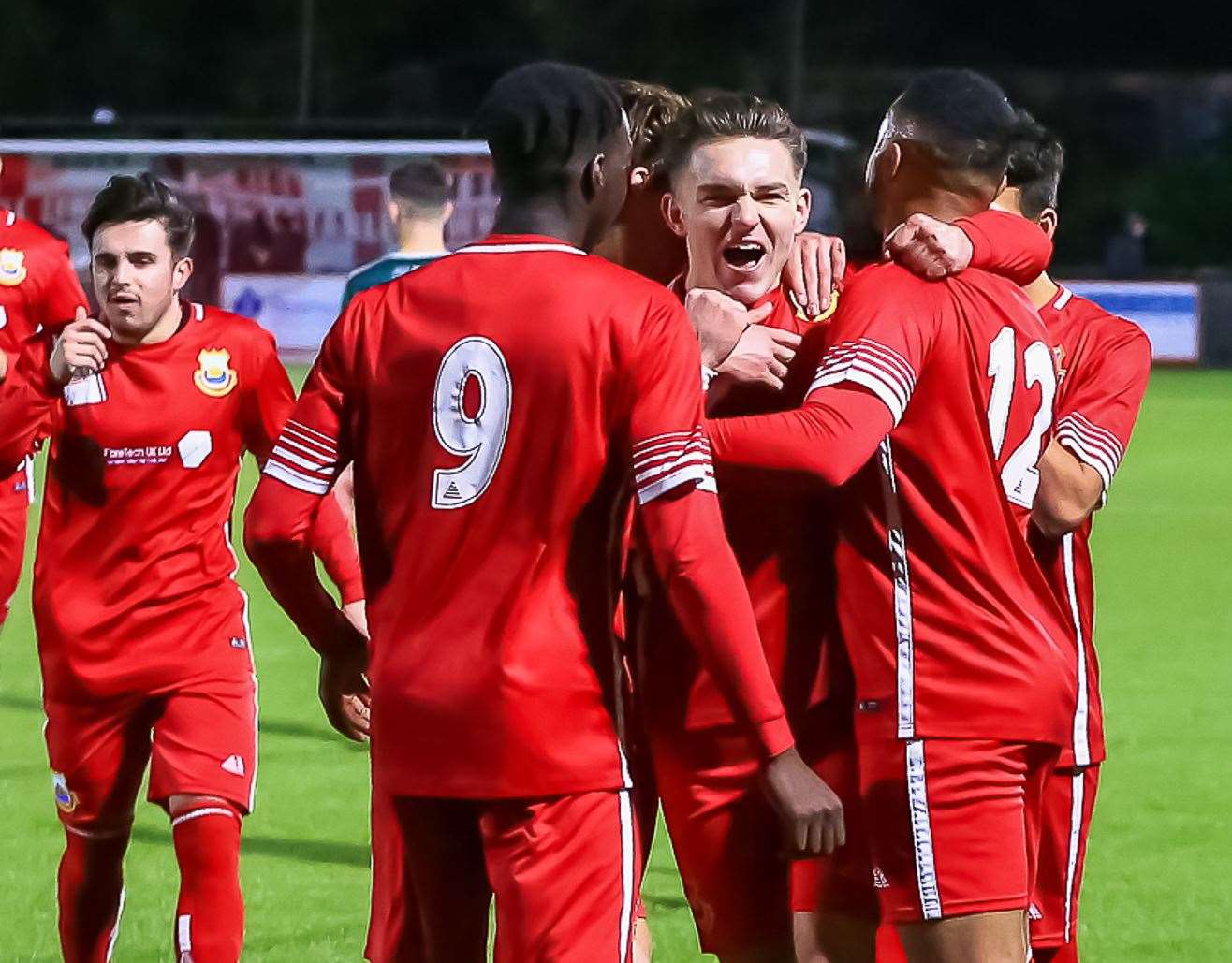 Substitute Josh Oliver celebrates scoring the fourth in Whitstable's 4-2 win over Canterbury City. Picture: Les Biggs