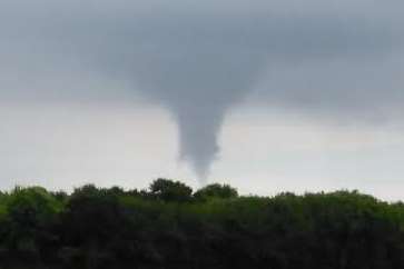 The funnel cloud seen over Adisham Water Tower. Picture courtesy of Suzanne Brooks