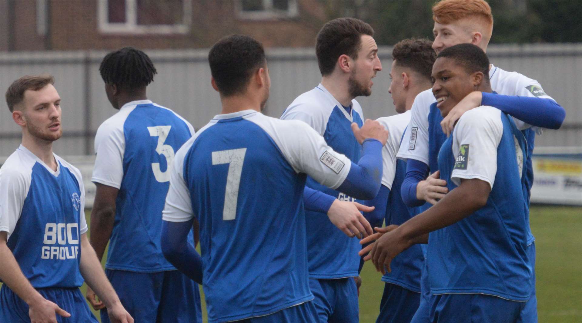 Herne Bay players congratulate Ronald Sobowale after he scored Herne Bay's second goal against Ashford on Saturday Picture: Chris Davey