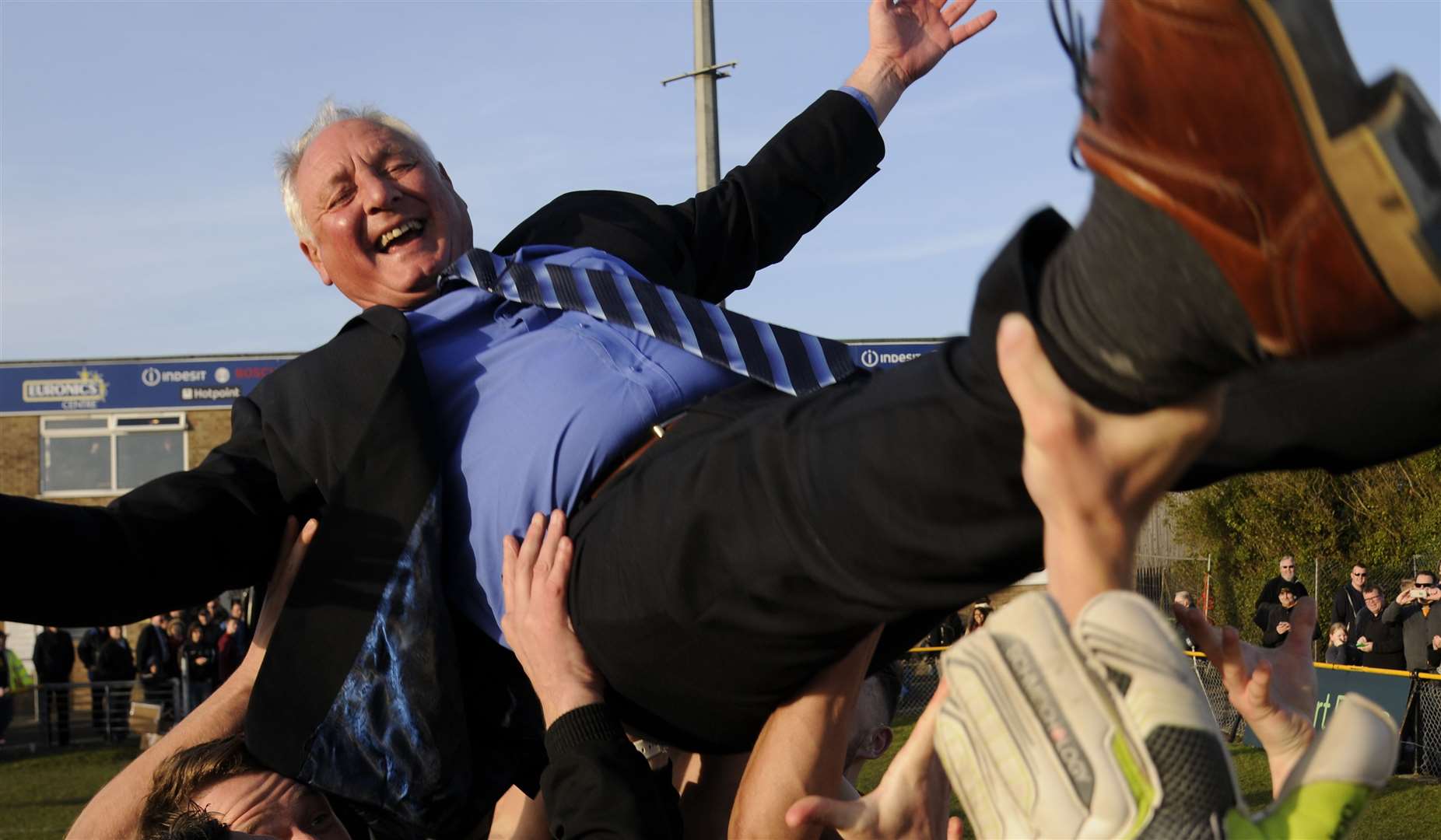 Neil Cugley is lifted aloft by his players in 2016 amid their title celebrations. Picture: Gary Browne