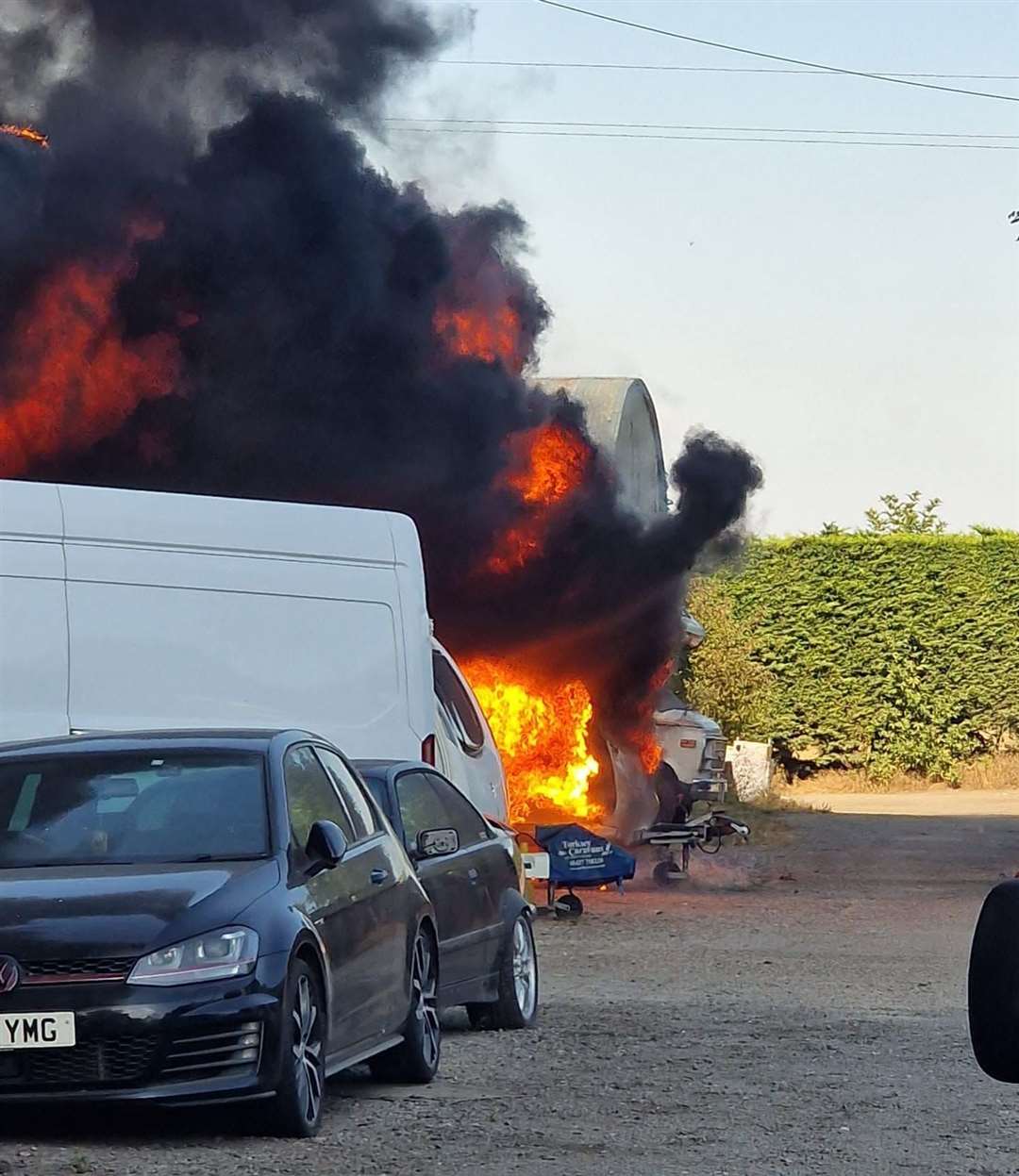 The fire in Birchwood Road, Dartford has destroyed several vehicles. Photo: Danny Russell