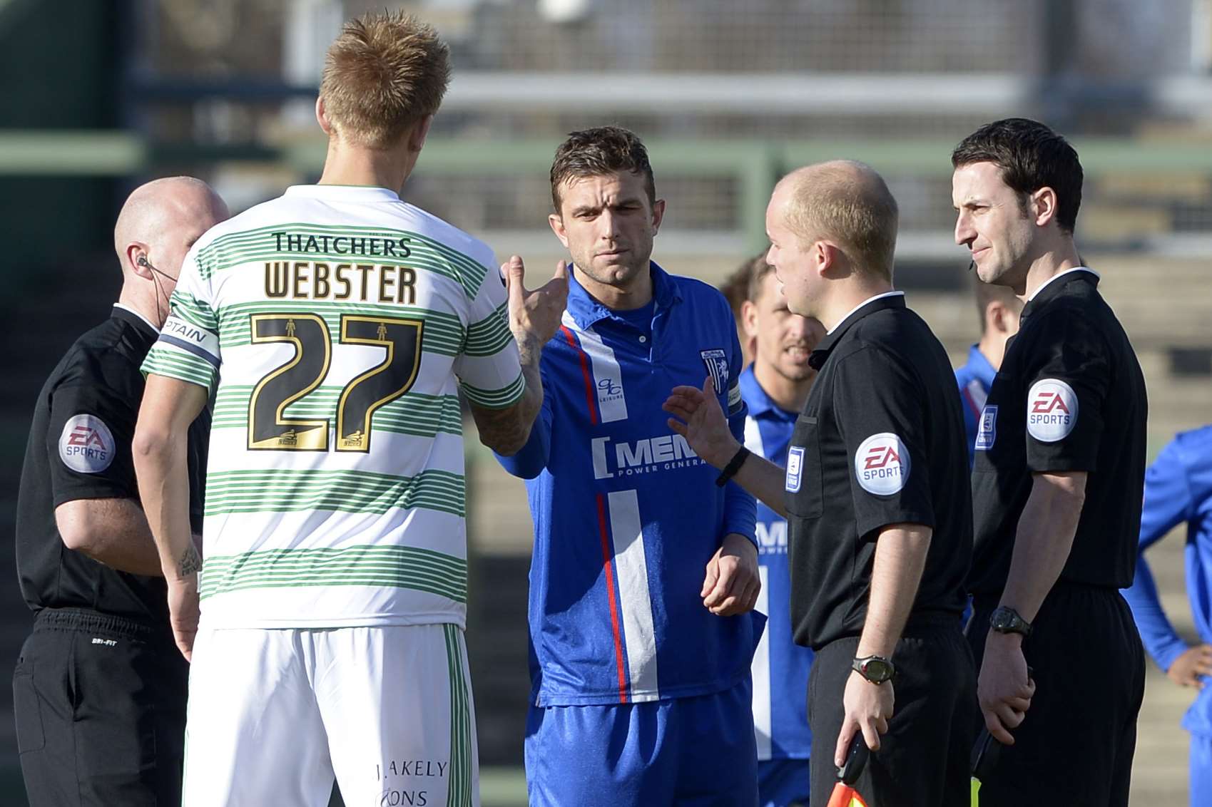 Referee Simon Hooper and his fellow officials meet the captains before kick-off at Huish Park last week Picture: Barry Goodwin