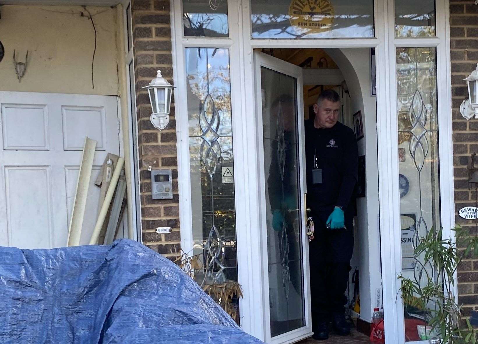 An officer at the home in Wentworth Drive, Dartford
