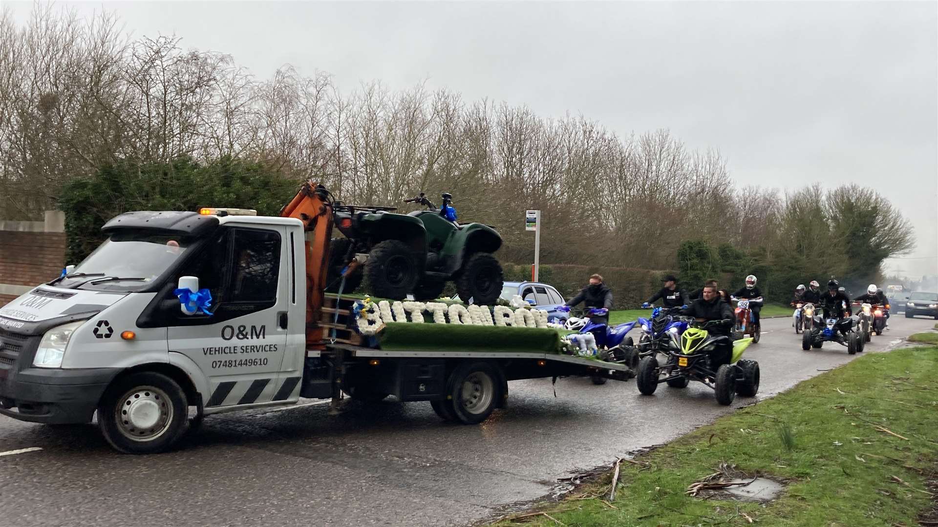 Car fan Frankie Wright's favourite quad bike was mounted on a flat-bed lorry for his funeral at the Garden of England cemetery, Bobbing. Picture: John Nurden