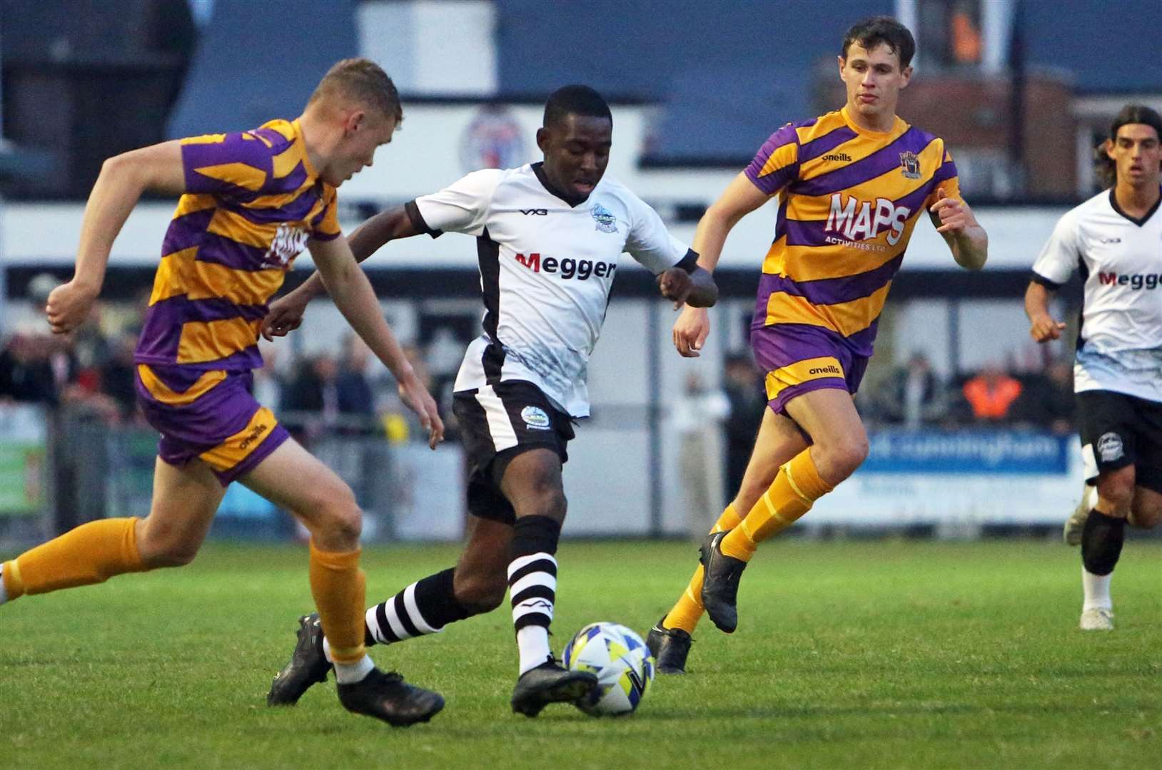 A Dover player is tracked by Deal duo Alex Green and Max Niblett in last Tuesday’s 5-3 friendly defeat. Picture: Paul Willmott