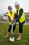 University vice-chancellor Prof Julia Goodfellow and James Morgan turn the first sod