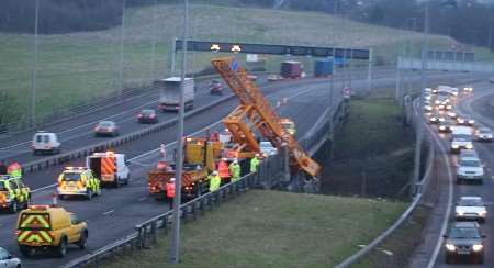 The clear-up operation in progress on the motorway this morning. Pictures: MIKE MAHONEY