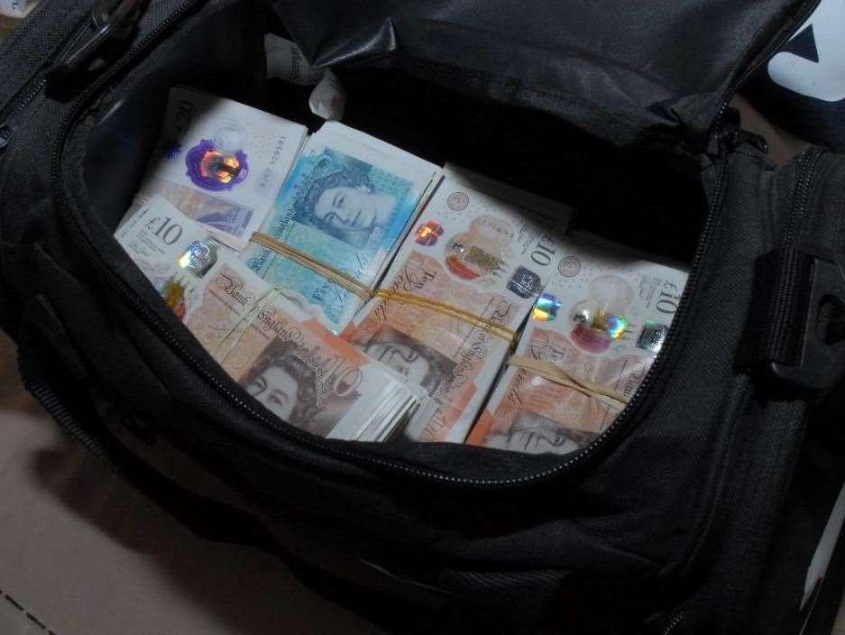 Cash uncovered in sports bag at the home in Sinclair Way, Dartford