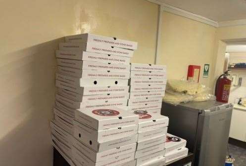 Preparing the mammoth pizza order at Ramsgate Football Club's ground