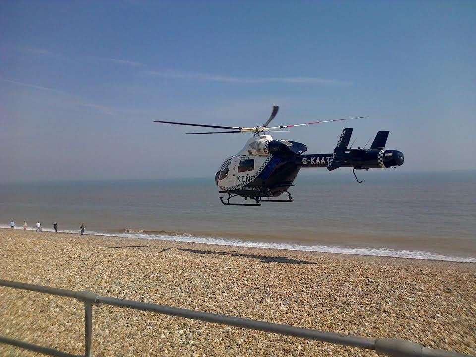 Air ambulance landing on Deal seafront