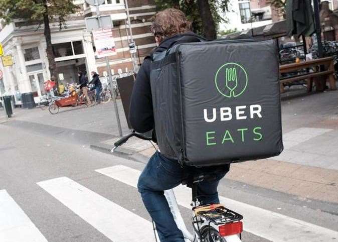 An UberEATS delivery cyclist