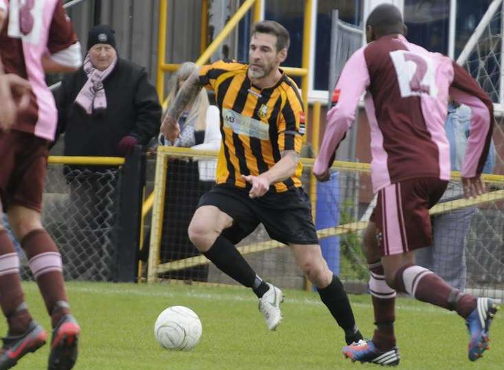 Paul Booth in action against Corinthian Casuals Picture: Gary Browne
