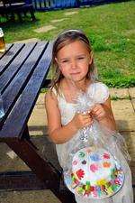 Therese Boston, six, with a special Oliver Smith Appeal cake