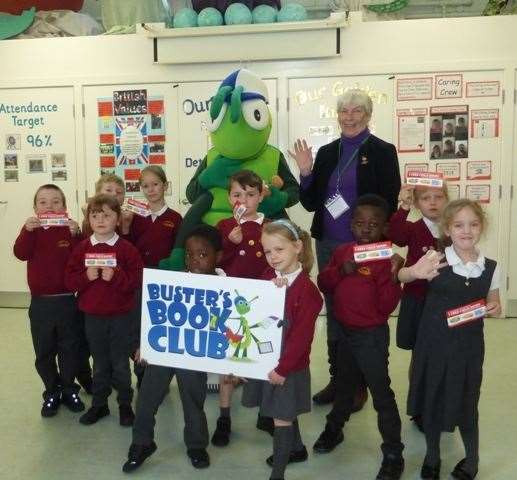 Children from St Peter’s Infants School in Rochester with their Diggerland vouchers, Diana Hill of Strood Rotary and Buster’s Book Club mascot Buster BugBuster's Book Club (10524784)