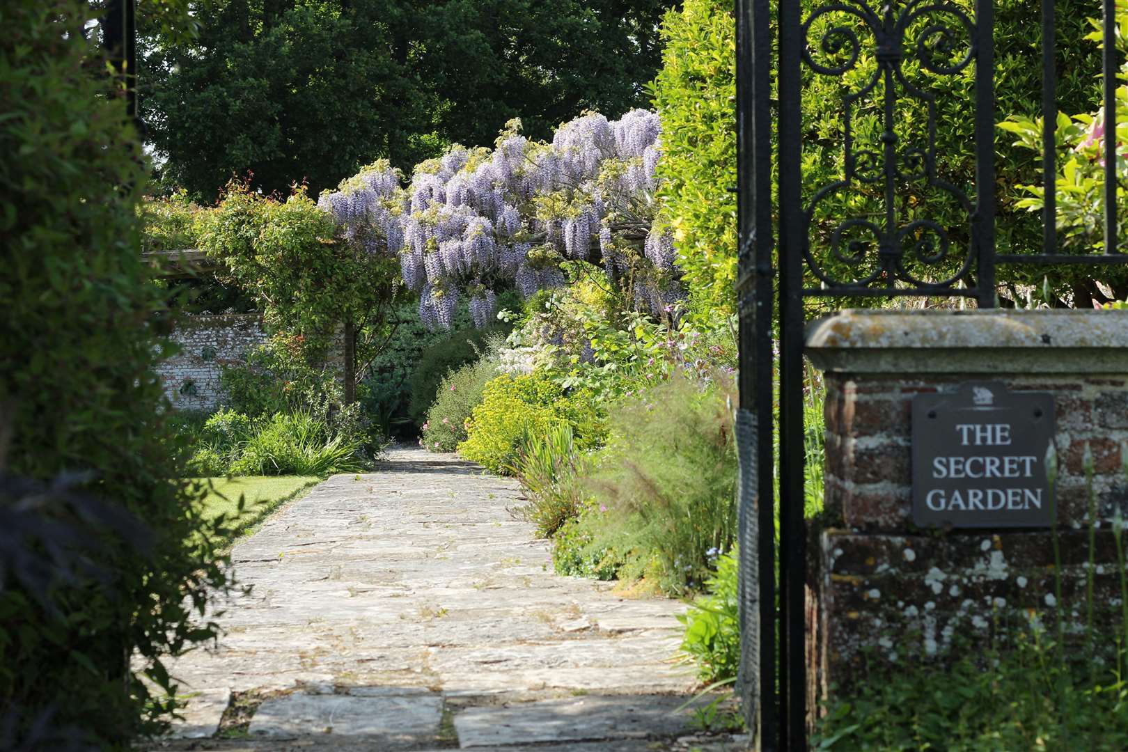 The gardens at Great Maytham Hall are famous for inspiring the novel the Secret Garden. Picture: National Garden Scheme