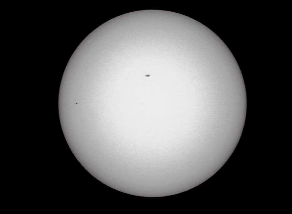 The Mercury Transit (small dot on the left) taken by Chris Rowden in Whitstable