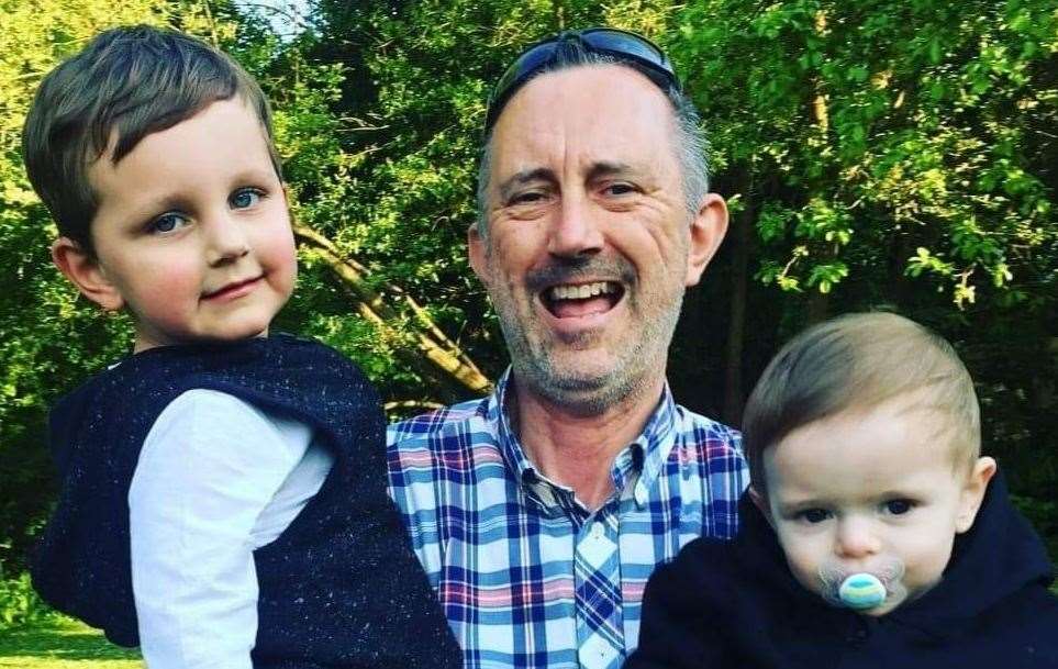 Paul Perkins with grandchildren Ronnie and Jacob