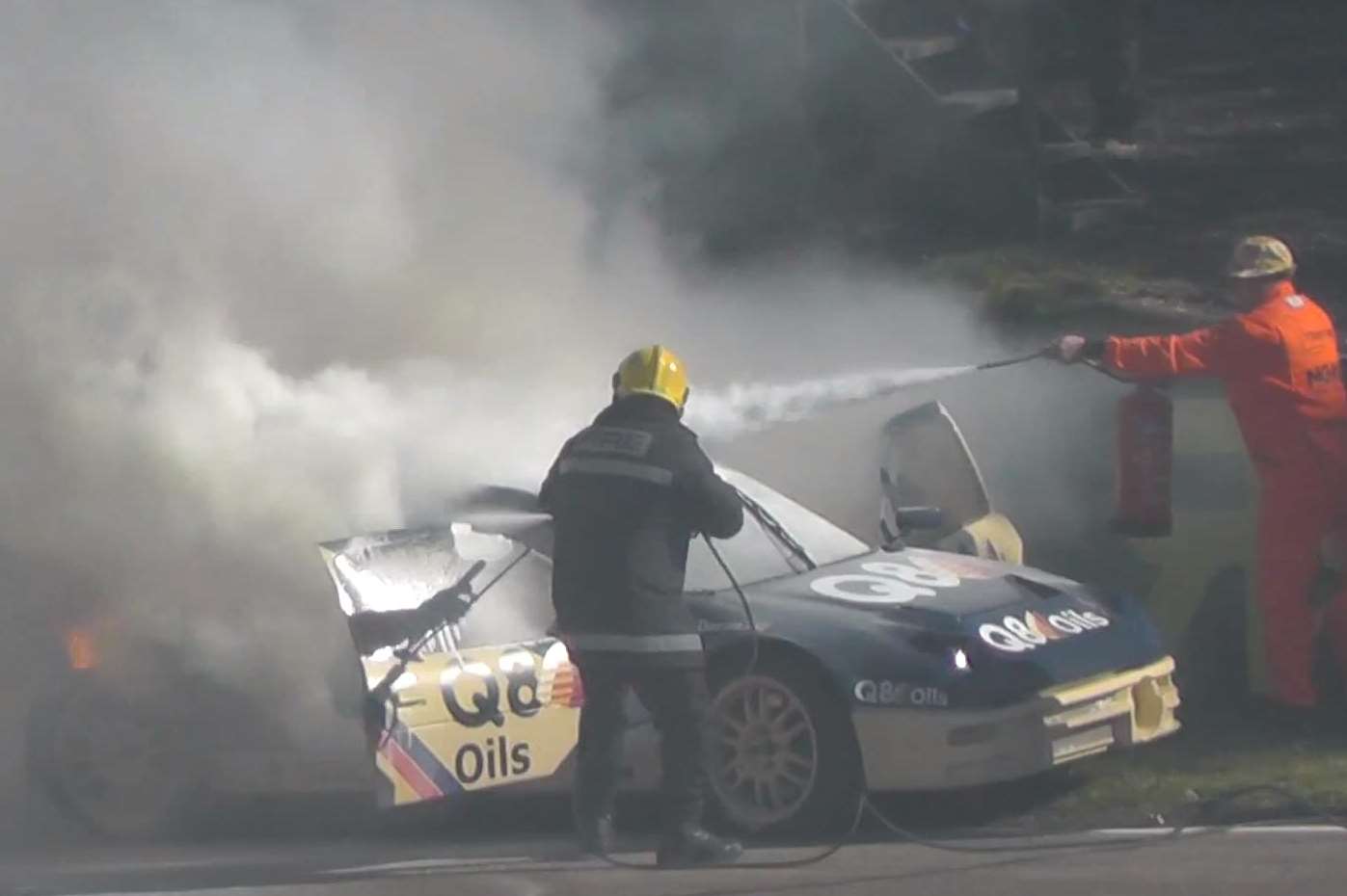 Fire crews arrive to tackle the blaze that engulfed Pat Doran's car. Picture: allthekasparas/YouTube