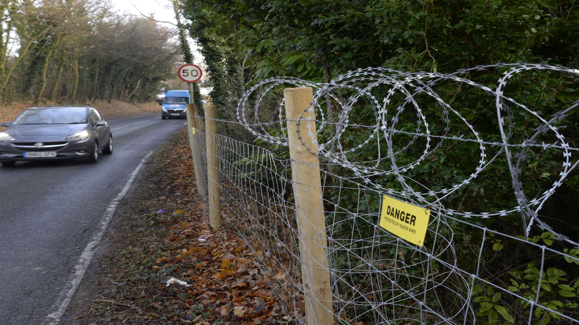 The razor wire along fencing in the Alkham Valley Road