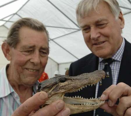 David Loader (left) and Kent Messenger Group president Edwin Boorman examine an alliigator head found in Maidstone. Picture John Wardley