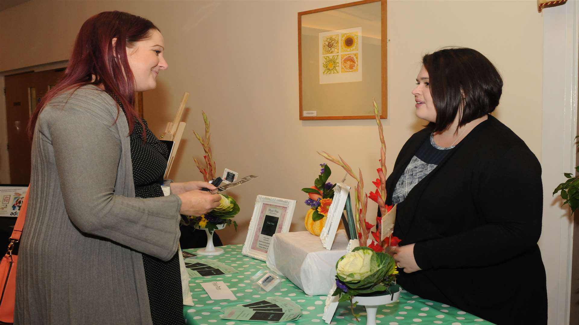 Hayley Heath, right, from Pixi-Pots Floral Workshop talks to Charlie Woodham from Unitemps at the A Blast! networking event