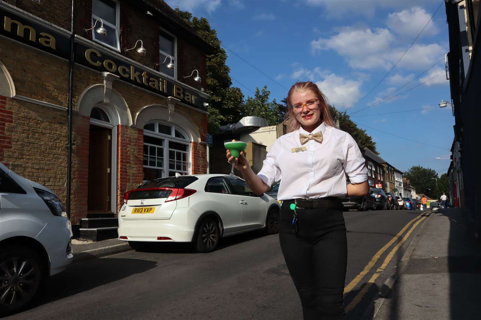 Amber Haddon with a cocktail outside the old King's Arms pub in Minster village, Sheppey, now relaunched as Charisma Cocktails