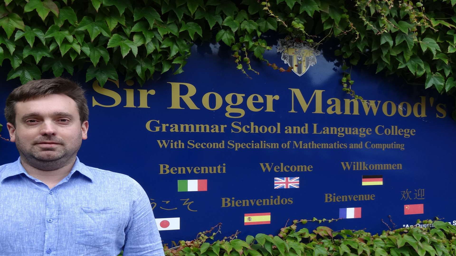 Thomas Molloy, School Business Manager at Sir Roger Manwood's School, is delighted with the donation from Vigilant Global