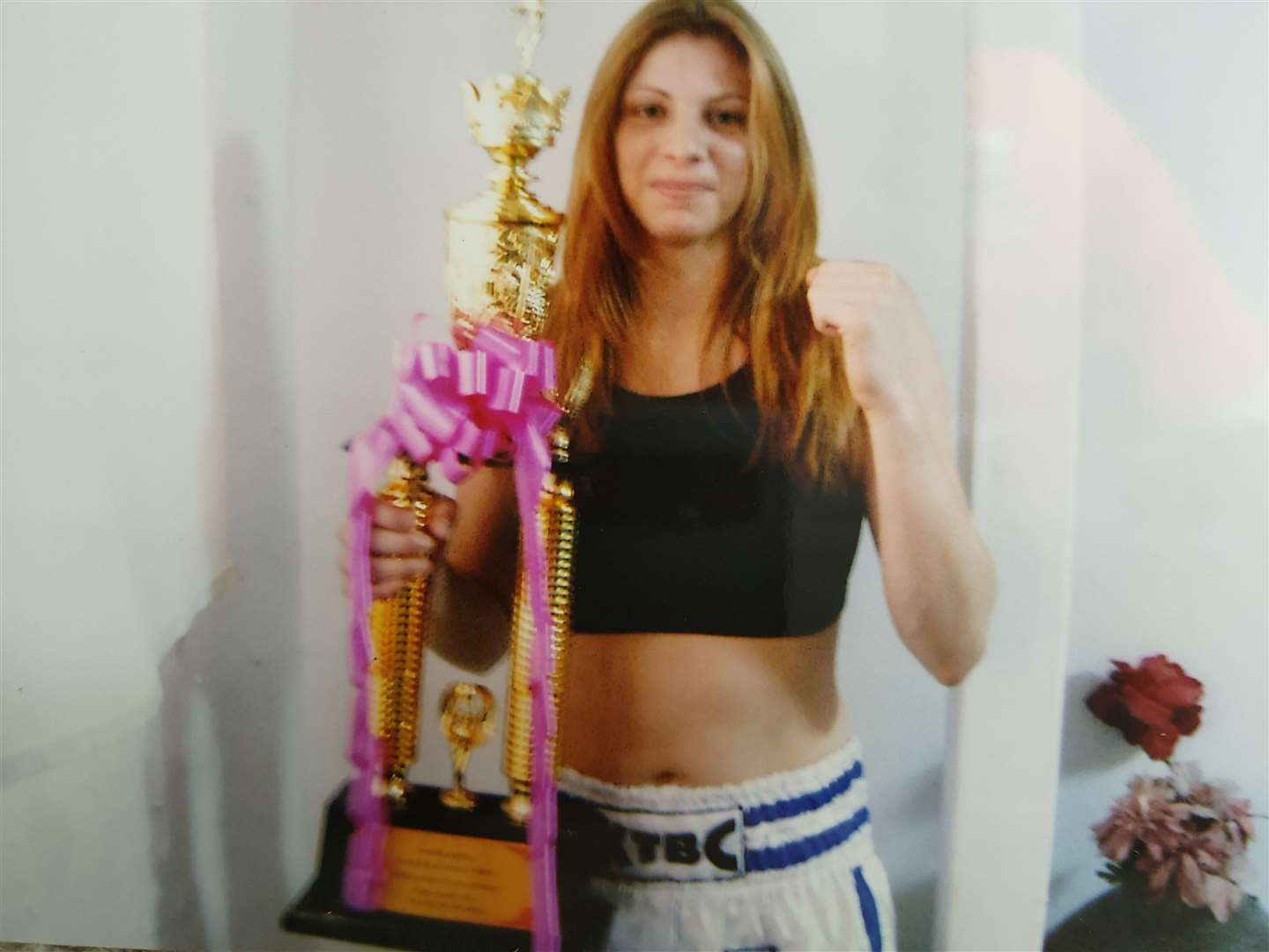 Nicola holding her trophy after fighting an inmate in Bangkok, Thailand. Picture: Nicola Ireland