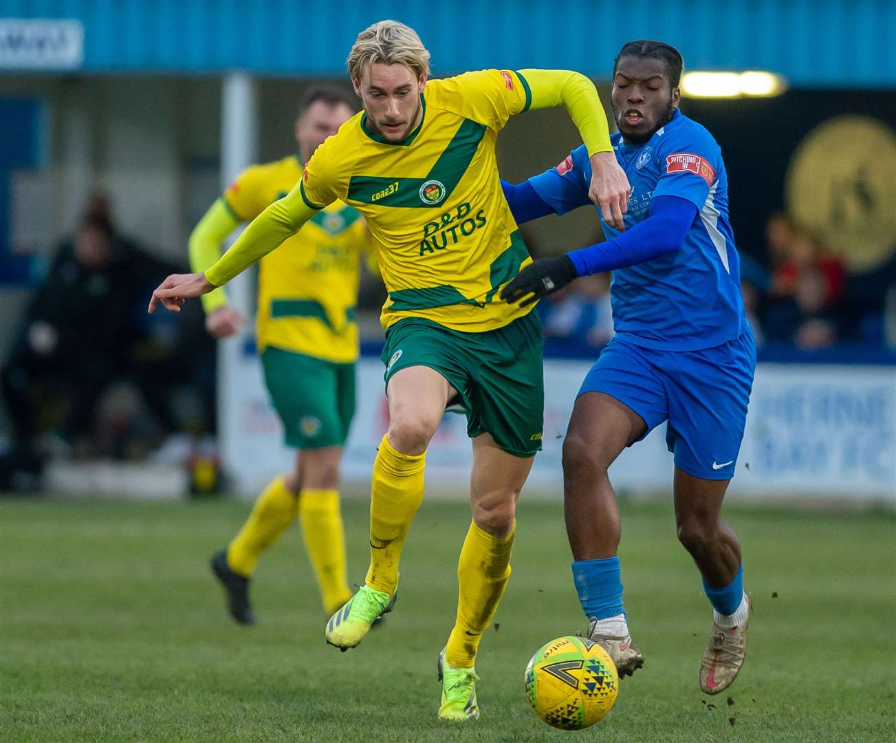 Ashford's Tommie Fagg battles Herne Bay's Bode Anidugbe in the league match at Winch's Field which was won by the Nuts and Bolts. Picture: Ian Scammell