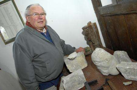 Churchwarden Tony Day in St Peter and St Paul Church, Newchurch, where the jinxed wooden head was stolen from