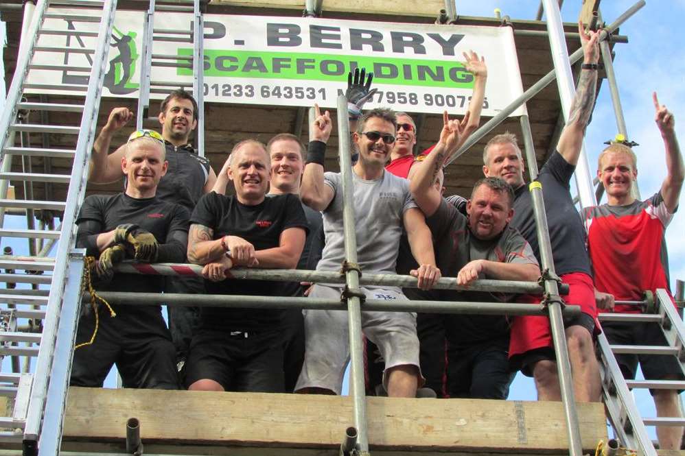 Firefighters after winning a Guinness World Record for climbing 42,290m within eight hours