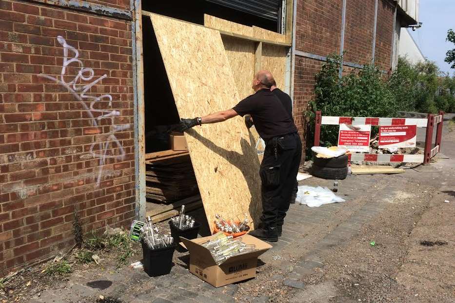 Officers investigating at the scene in June