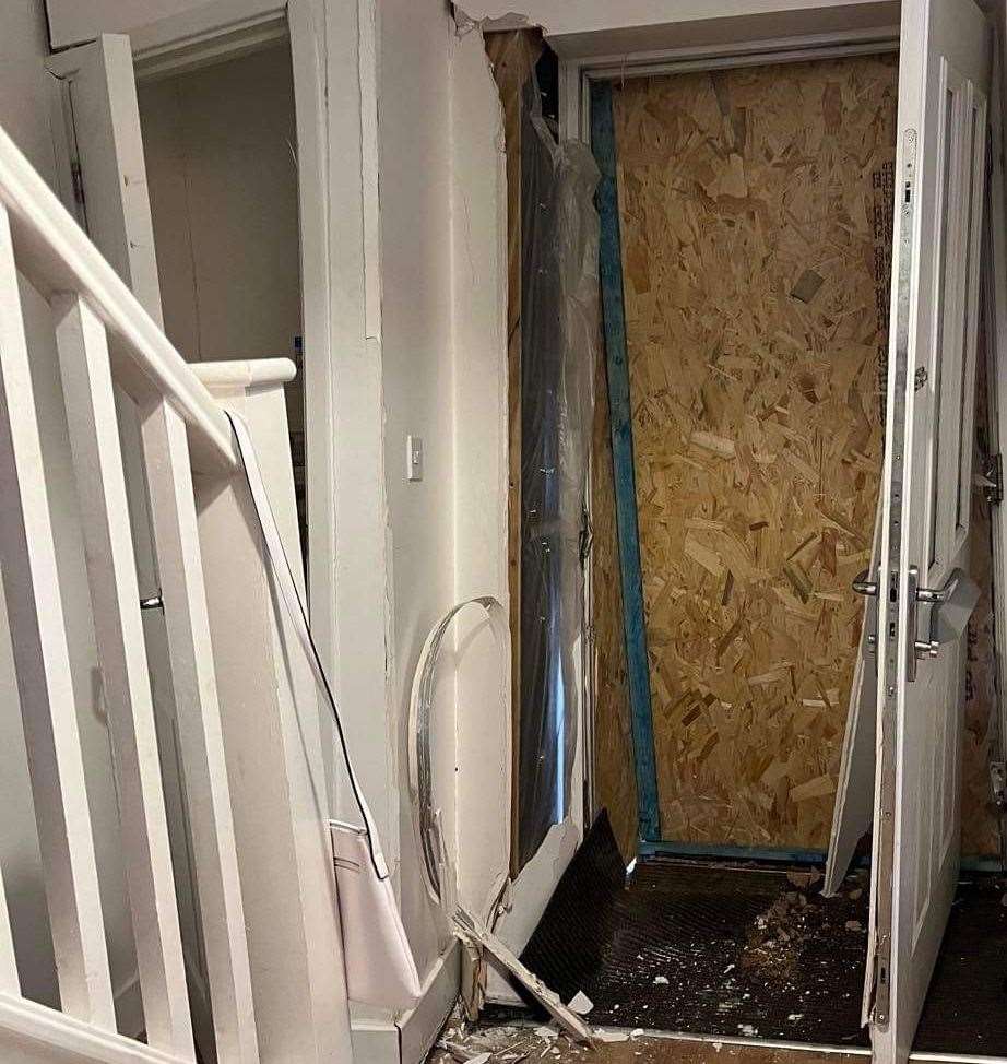 Since the accident the front door has been boarded up. Picture: Allana Spencer