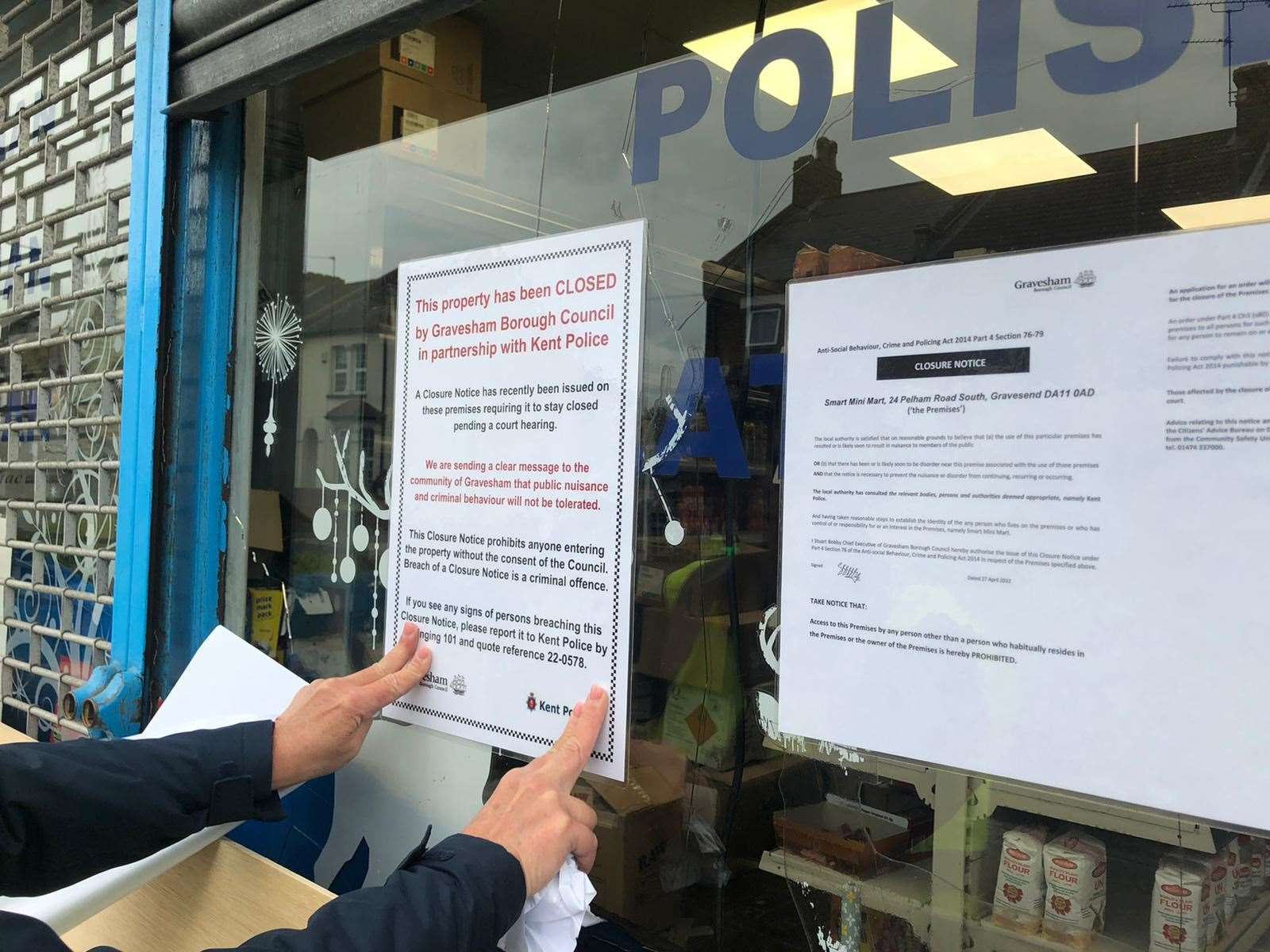 A closure notice is put in the window of Smart Mini Mart in Pelham Road, Gravesend