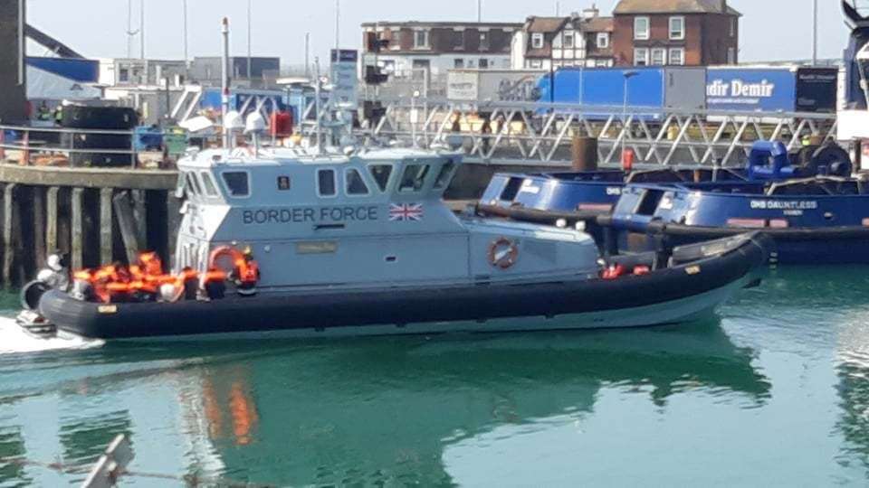 Asylum seekers are brought into Dover in a Border Force Search boat